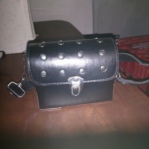 Purse 4. 5 in. Ht 5 in. Width 2 inch bottom L